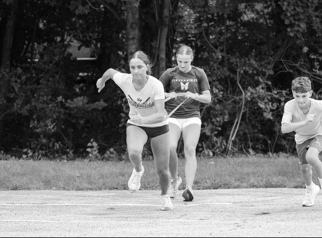 Athlete performing a band-resisted sprint at WSP.