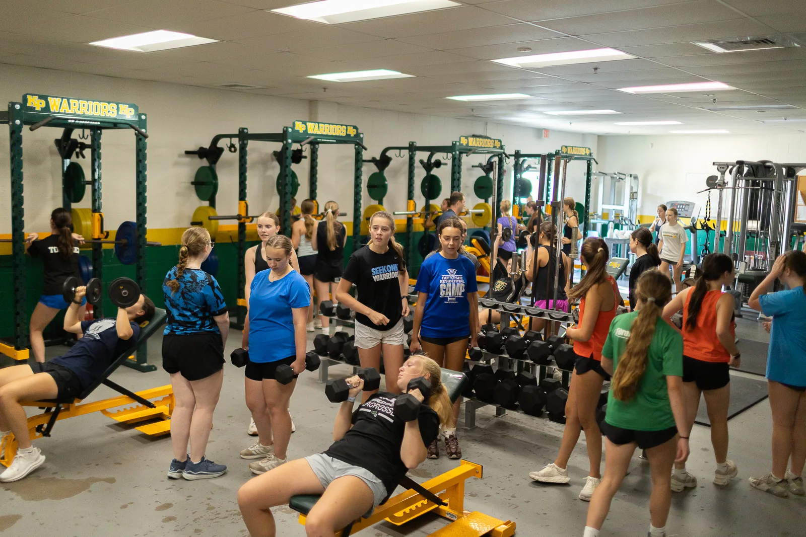 Coach instructing the gym group