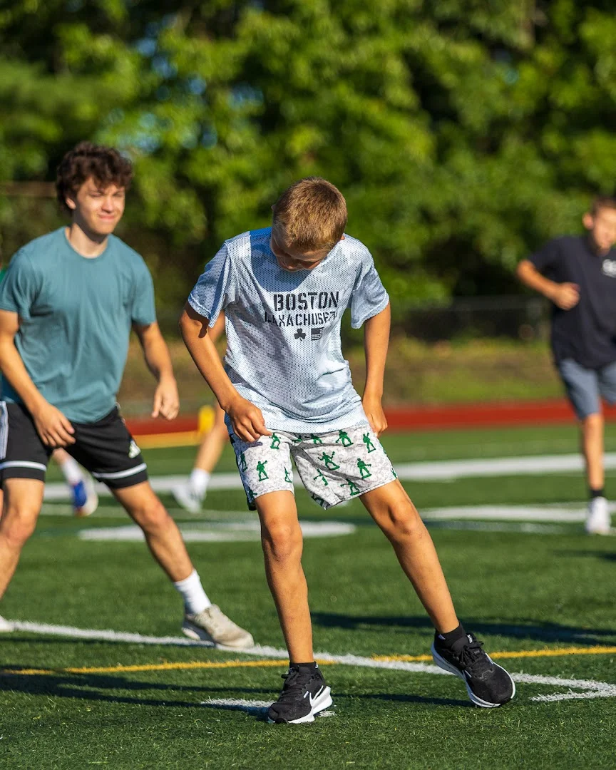 Athletes practicing lateral footwork at GUT Camp