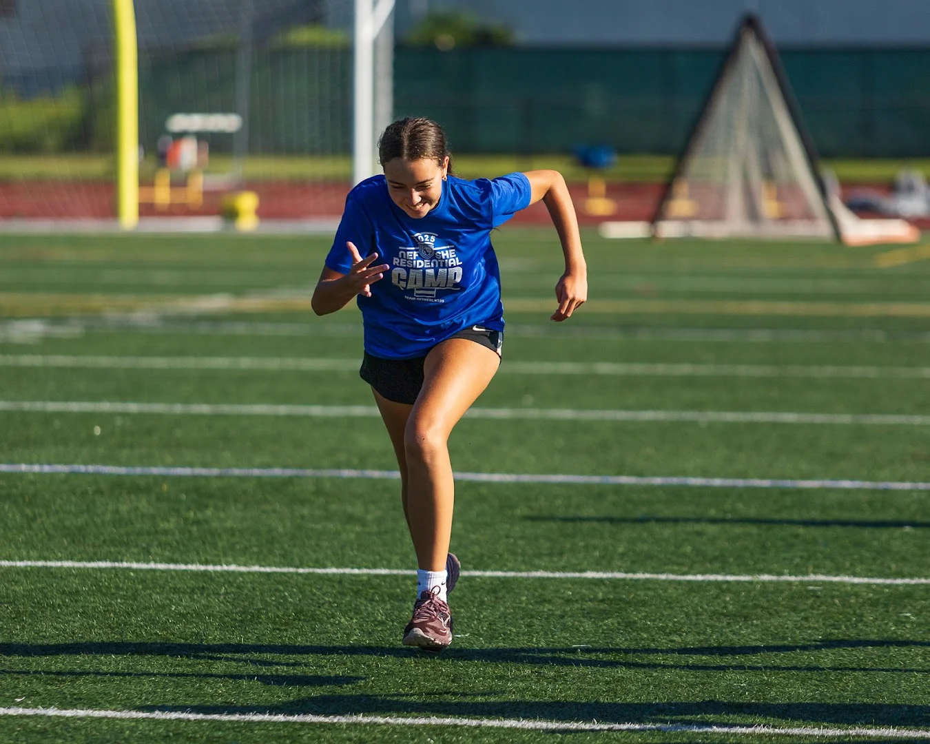 Athlete accelerating toward the camera at GUT Camp