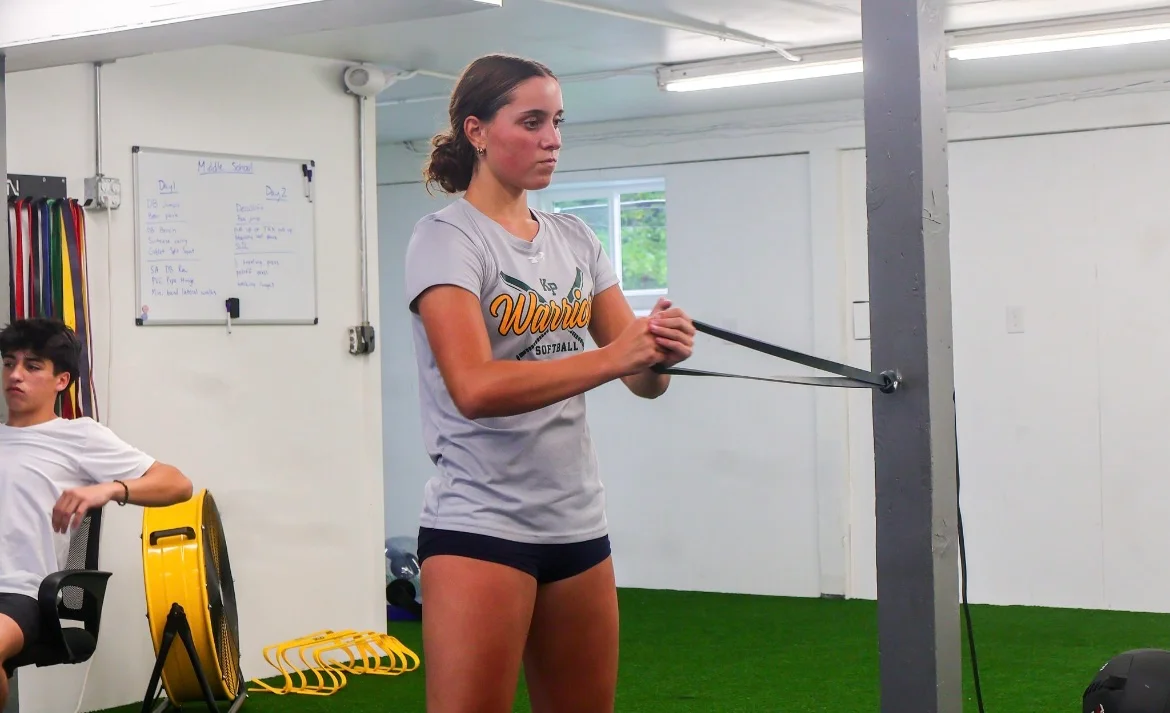 Athlete performing a resistance-band exercise at WSP