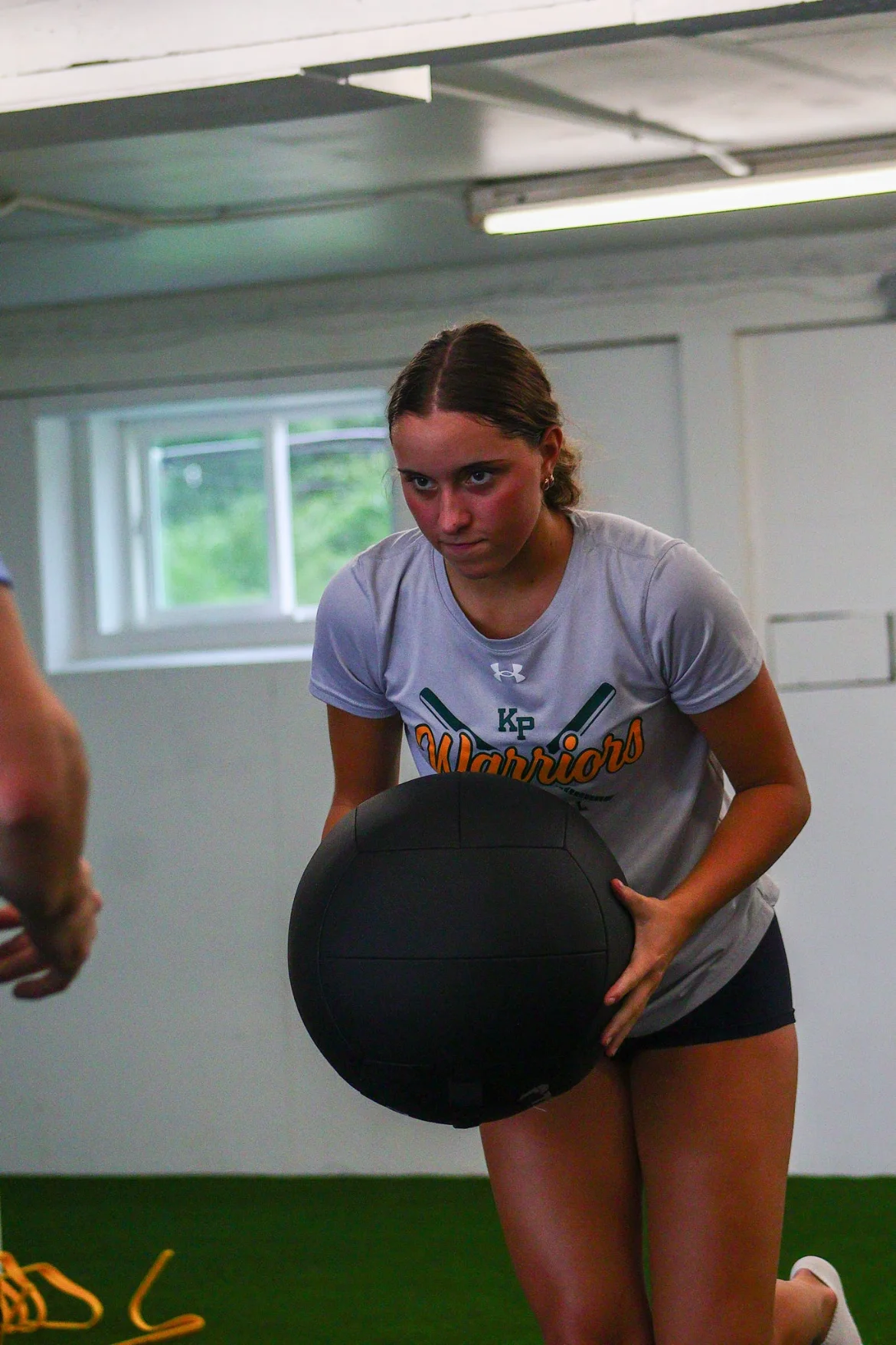 Athlete training with a medicine ball at WSP