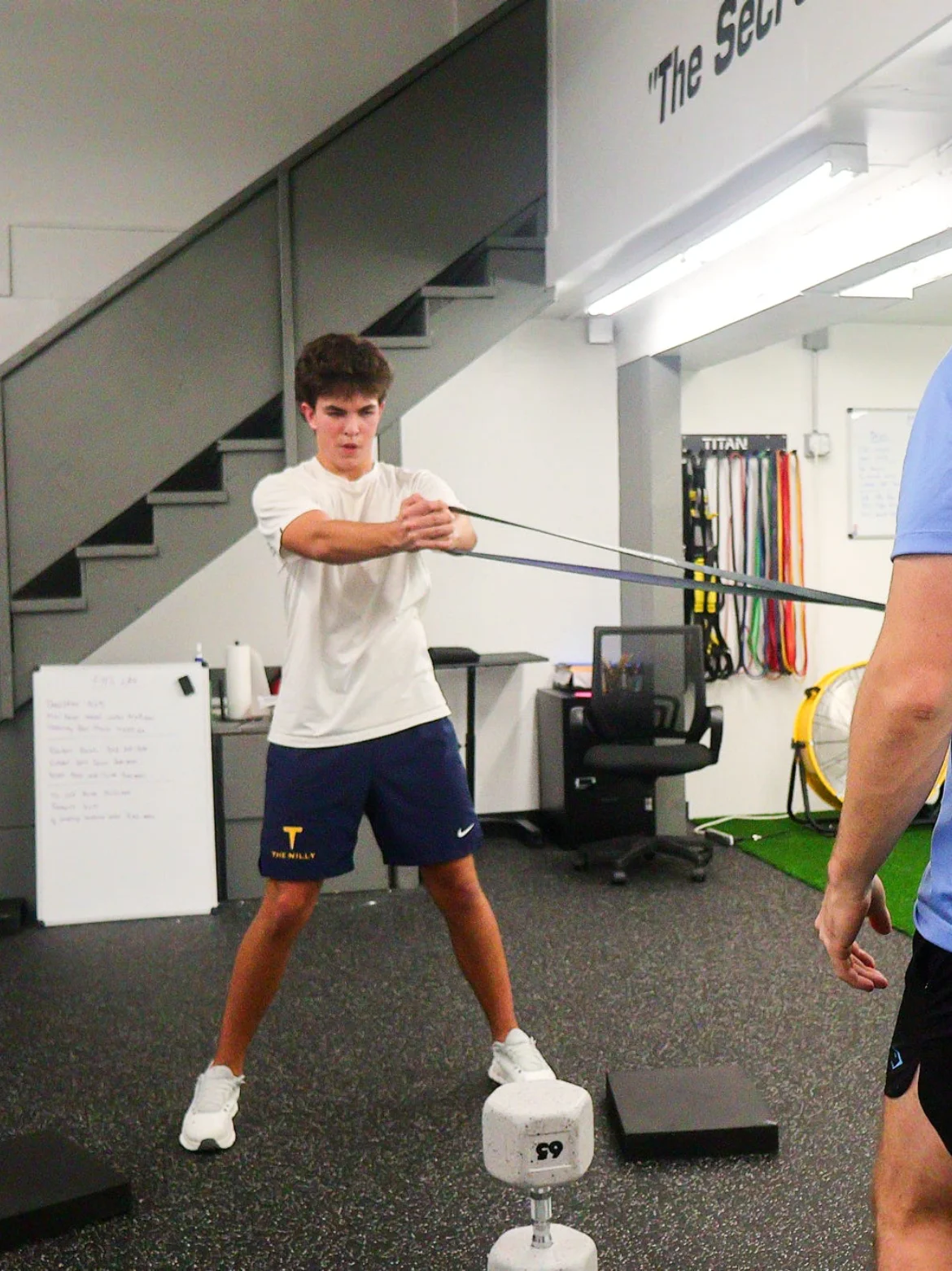 Athlete performing a resistance-band exercise at WSP