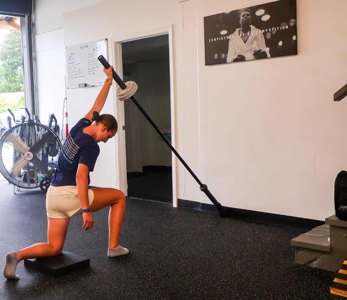 Athlete performing a landmine press at WSP